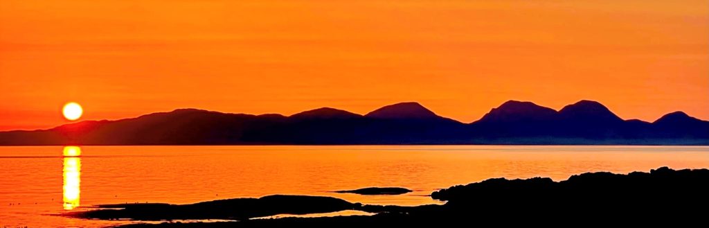 Gigha resident Keith Wilson submitted this photograph of the summer sun setting over Jura, as seen from West Tarbert Bay on the island.