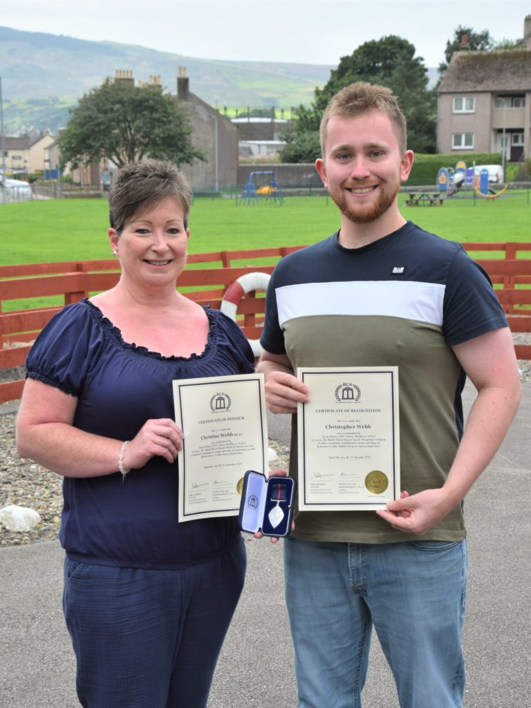 Christine and Christopher Webb with their British Citizen Awards.