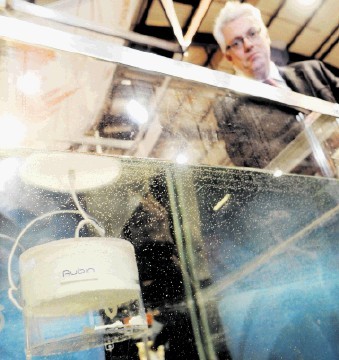 BUOYANT SOLUTION: Paddy Collins of Aubin with a model of his Gel Lift System