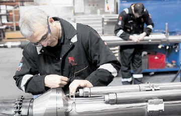 PRECISION: Red Spider technicians at work . . .  their firm is in the running for the ICoTA European Chapter Innovation Award