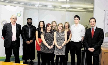 Paul Lawson, late life strategy manager within BP’s finance department for North Sea operations (far left)  and Dr John Park, Charles P Skene Entrepreneurship Programme leader (far right), with winning students from RGU