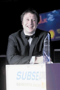 GOOD REASON TO SMILE: Robert Eddon, winner of Young Emerging Talent at Subsea UK Awards