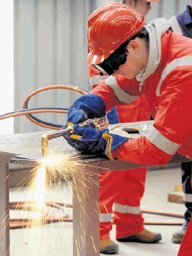 SPARKS FLY: Trainee welders at the Nigg centre. Sandy McCook