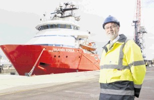 CORNERSTONE: Ken Reilly . . .  at the quayside with the Skandi Foula