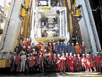 FULL CREW: Mass gathering of personnel aboard the advanced rig Stena Tay, which was the first to use Nautronix technology for "surface BOP" (blow-out preventer) drilling. This was initiated by Shell