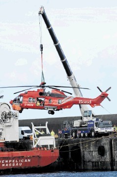 AIRBORNE:  Super Puma  is  brought ashore at Peterhead. Kenny Elrick