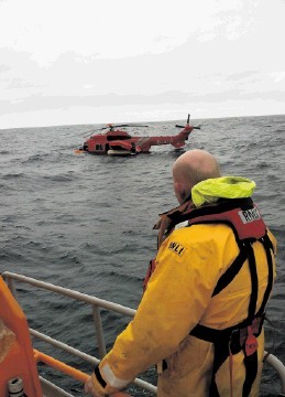 FLOATING: This RNLI photo shows the Bond Helicopter ditched in the North Sea