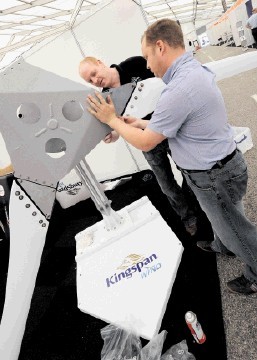 GETTING SET: Gavin Kerr and Tony Staniforth prepare their Kingspan Wind stand for All-Energy 2012. Colin Rennie