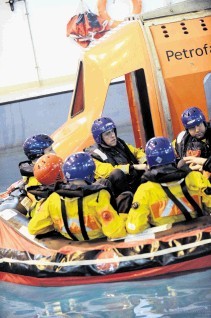 Offshore personnel undergoing safety training at Petrofac Training, Altens, Aberdeen