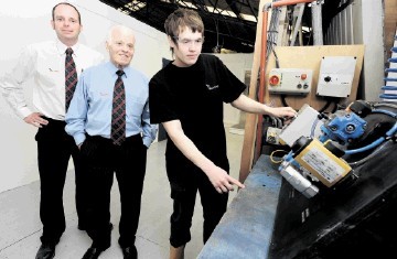 NEW ERA: From left, David Robertson,  Jim Milne and trainee William Thomson in the BOE training unit.  Kenny Elrick