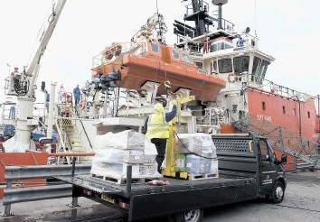 PROSPERING: Supplies from CIS are loaded on to a ship at Aberdeen harbour