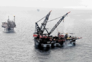 INVESTMENT: One of the world’s largest heavy-lift vessels poised to manoeuvre the platform’s jacket in place