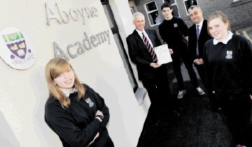 PRACTICAL UNDERSTANDING:  Clive Gregory, left, with  Raymond Jowett and Aboyne Academy pupils, from left, Kirsten Knight, 14, Stuart Masson, 14 and Emma Scott. Colin Rennie