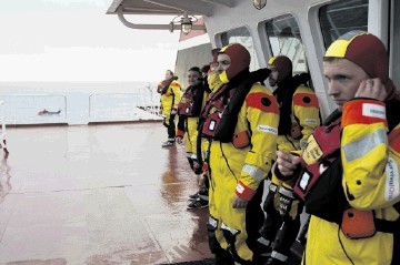 Rescued  –  safely aboard ship after the  Super Puma helicopter ditching