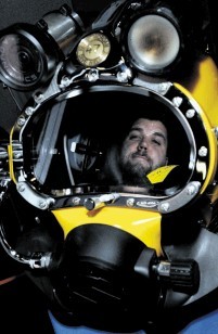 SUBSEA KIT: Dale Johnston, of Glasgow Caledonian University with a Kirby Morgan dive helmet