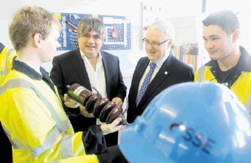 BRIGHT FUTURE: Ian Marchant, left, and James Fraser with trainees  William McPhee, left, and Adam MacLeod. Sandy McCook