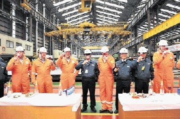 CAUSE FOR CELEBRATION: BP Clair Ridge . . . cutting first topsides steel in South Korea