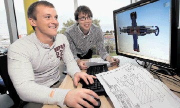 DEVELOPING TALENT: HES project engineer Clark Bain, left, with trainee design engineer William Rowe