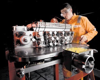 EXPERTISE:  A Proserv technician works on a subsea controls system