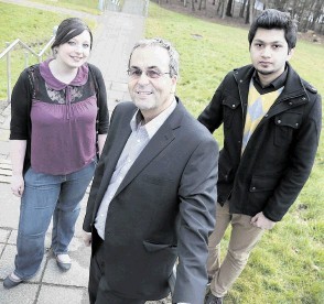 INSPIRATIONAL: Global Energy executive chairman Roy MacGregor with  management and marketing students Joni Craigie, left, and Ali Rizvi