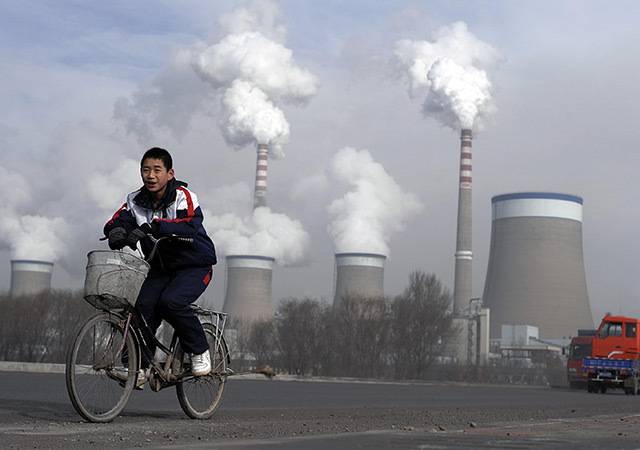 Cooling towers of a coal-fired power plant in Dadong, Shanxi province, China