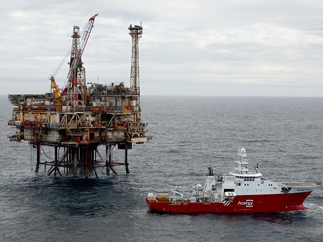 The Acergy Petrel alongside the Forties Bravo platform undertaking pipeline survey and inspection works.