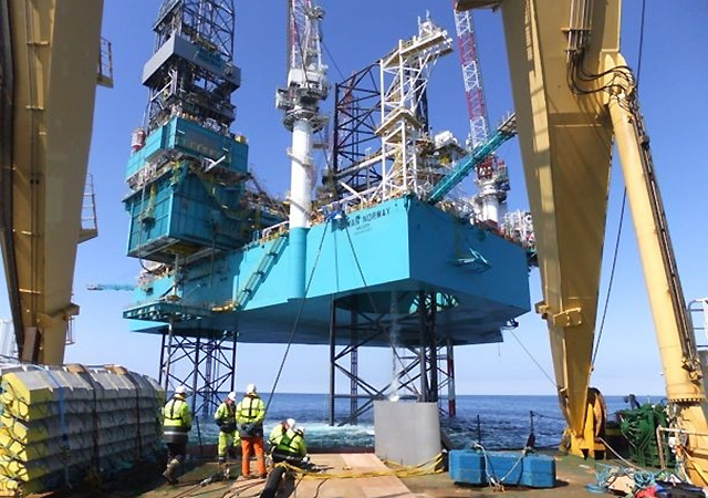 Construction work on Xcite's Bentley field with the Rowan Norway jack up rig in the background