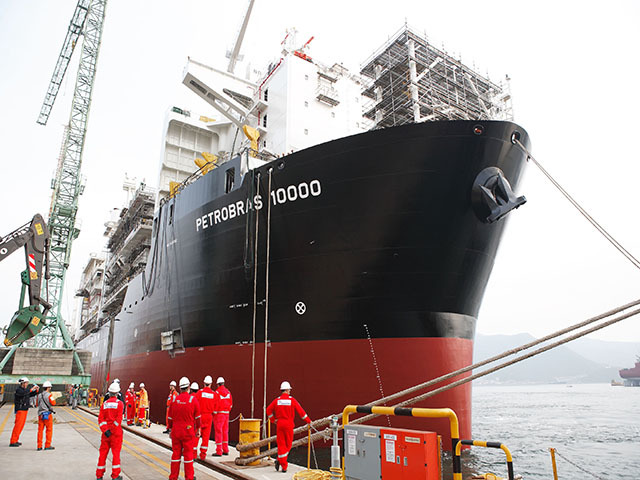 Petrobras’ recent announcement of 41% cuts to spending means that scenes like the arrival of this new production ship in 2013 will become rarer with suggestions that only half of 29 proposed FSP may be built
