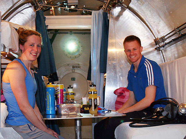 Hannah Miley and friend Euan Duff settle down for an altitude training trial in one the hyperbaric chambers