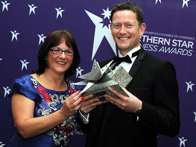 Brian Chalmers, Wood Group PSN with  Carole Benzie, Aberdeen Airport - Rising Star award, The Northern Star  Business awards, AECC
