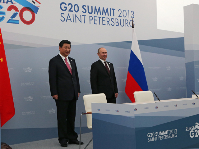 Russia's President Vladimir Putin and President of the People’s Republic of China Xi Jinping before the signing of joint agreements at the G20 Leaders' Summit in Strelna.
Photo: Russia G20