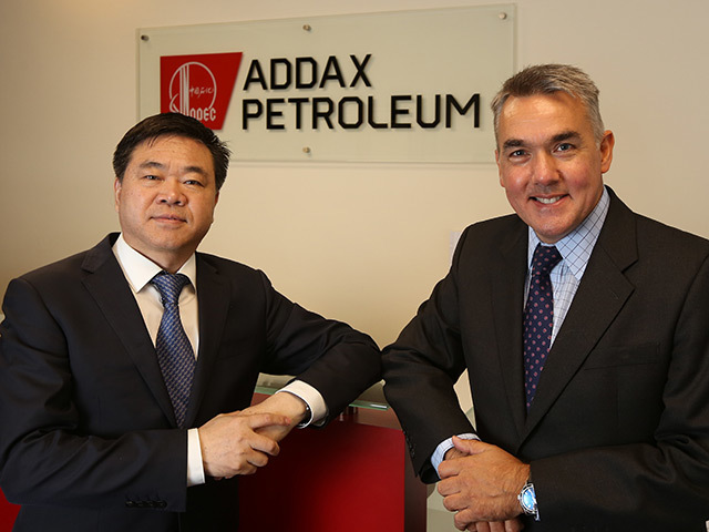 Addax CEO Yi Zhang, and John Warrender, MD of Addax UK, at the opening of their Aberdeen office last month.