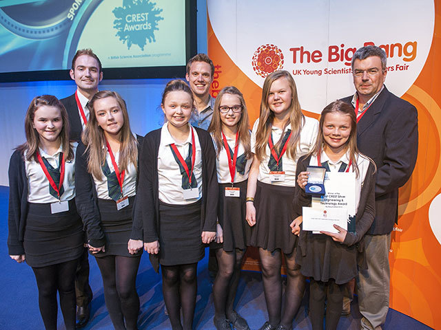 TOP TEAM: Hazlehead Academy pupils, from left, Emily Newlands, Alysha Herd,
Emily Buchan, Emma Catto, Rebecca Bruce and Olivia Reid, pictured with teacher
Neil McAleenan, far left, host Greg Foot and judge Grant Paton
