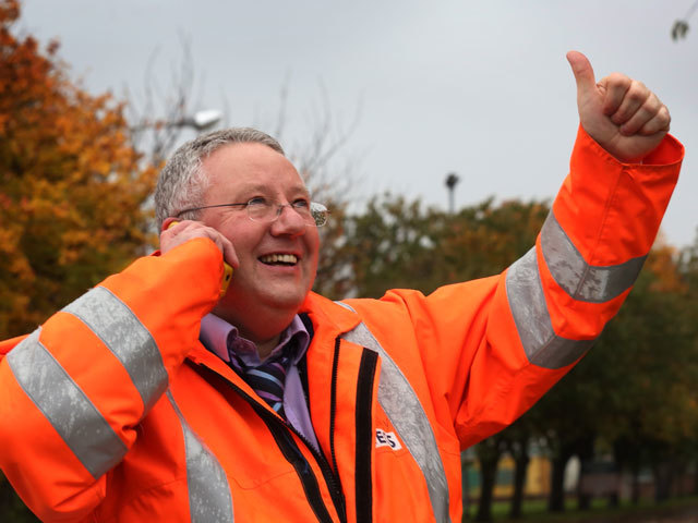 Worker Eddie Heaney celebrates after an announcement by owners Ineos to keep the Grangemouth petrochemical site open