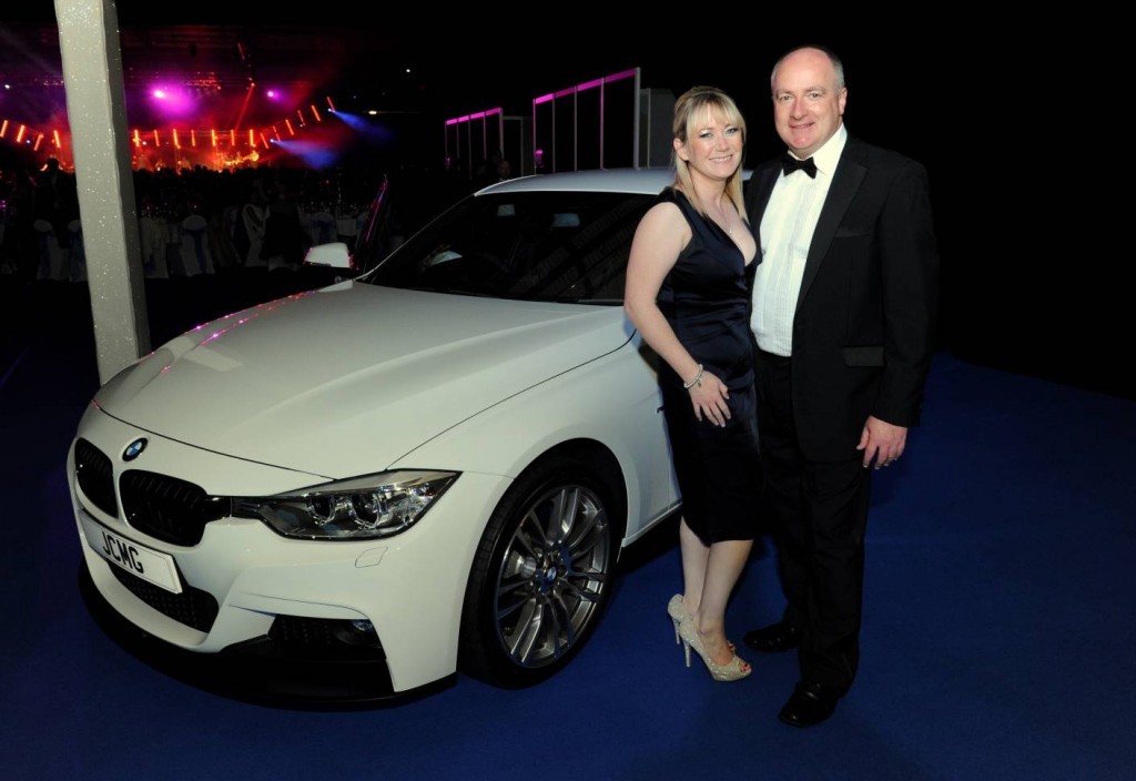 Tracey Taylor and Mike Cronin infront of a BMW at the Energy Ball 2013
