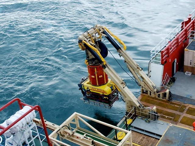 ROVs come in all shapes and sizes. Here’s one being lowered into the water from a ship. What will it do on the seabed?