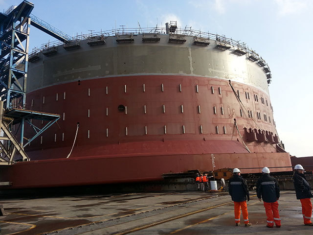 In under three hours the hull was skidded on to a submersible barge from which it was later floated off and moored in its wet berth on December 19