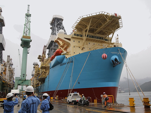 Drillship moored at a dock