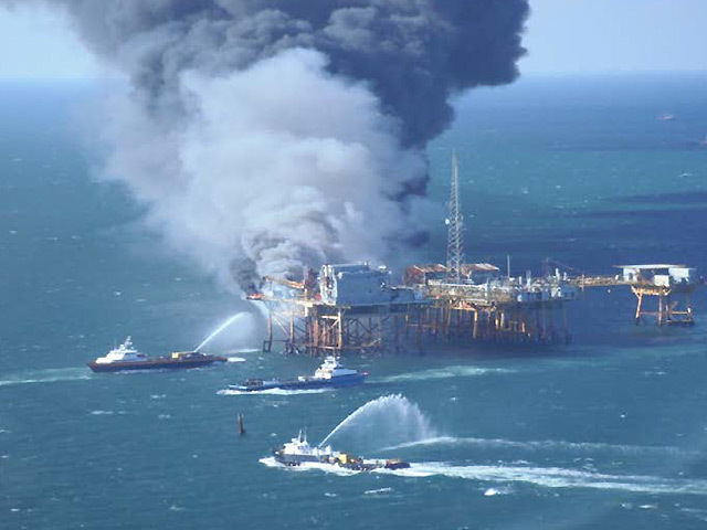 Firefighting vessels tackle the blaze on Black Elk's West Delta platform. Picture: US Coast Guard