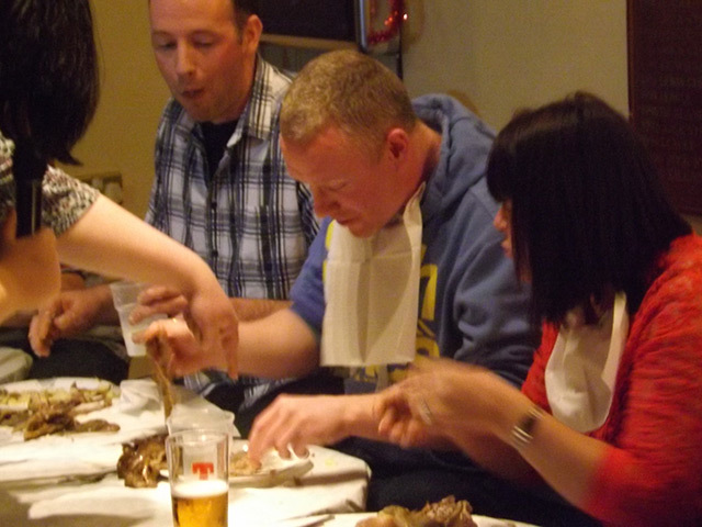 Peter MacCritchie, centre, beats his other diners at the World Guga Eating Championships on Lewis