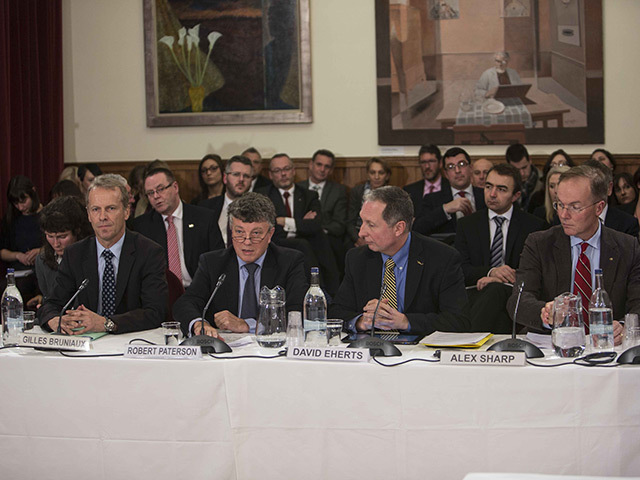 Robert Paterson, second from left, addresses a session with Airbus and Sikorsky representatives