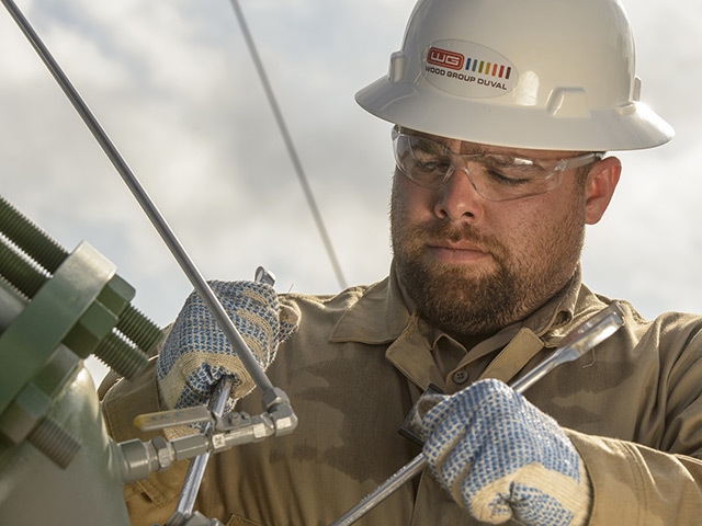 Wood Group Duval technician carrying out hydro test operations in Eagle Ford Shale region, US