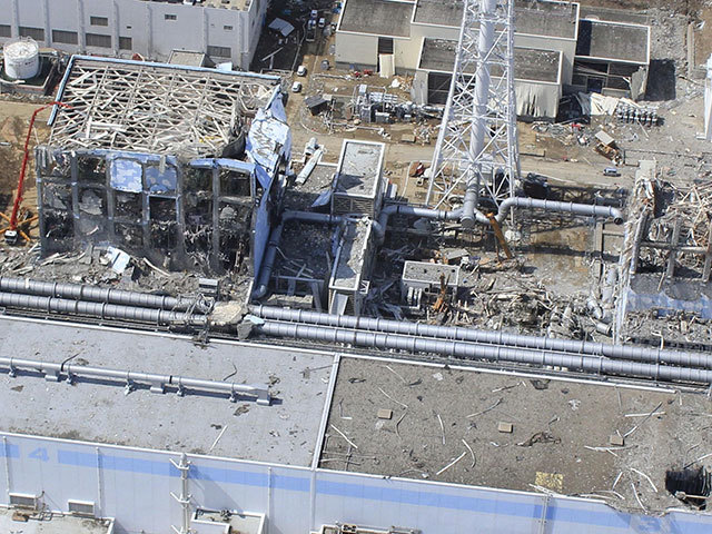 Unit 4 , left, and Unit 3 of the crippled Fukushima nuclear plant