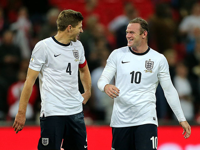 England's captain Steven Gerrard (L) and forward Wayne Rooney