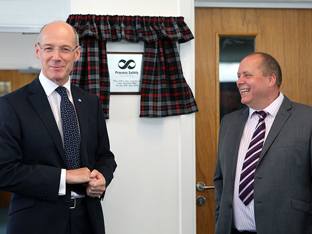 Cabinet Secretary John Swinney (L) officially opened the new PSS facility in Wick, alongside PSS founder David Green