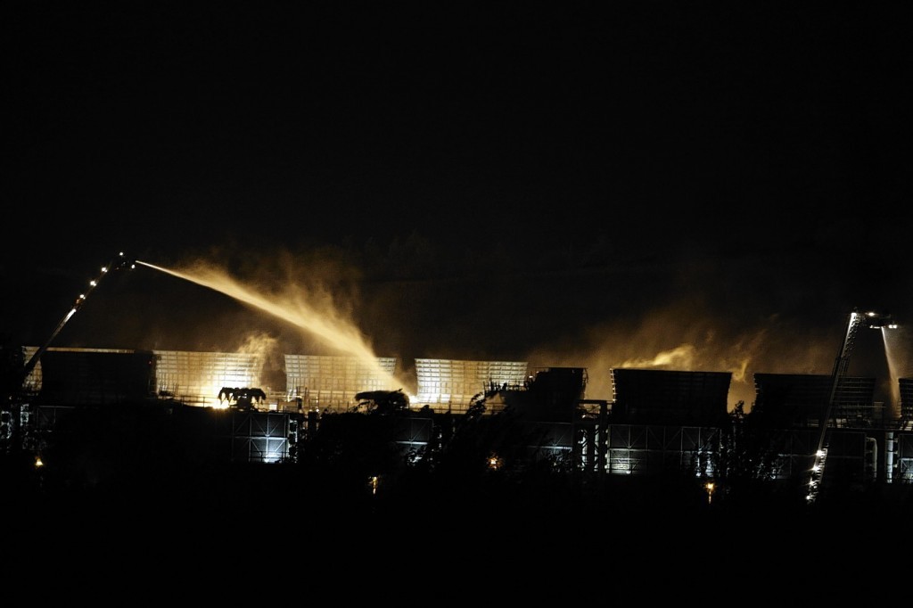 Fire crews spray water at the scene of a fire at Didcot B Power Station in Oxfordshire.
