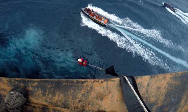 Greenpeace activists boarded an oil rig in protest