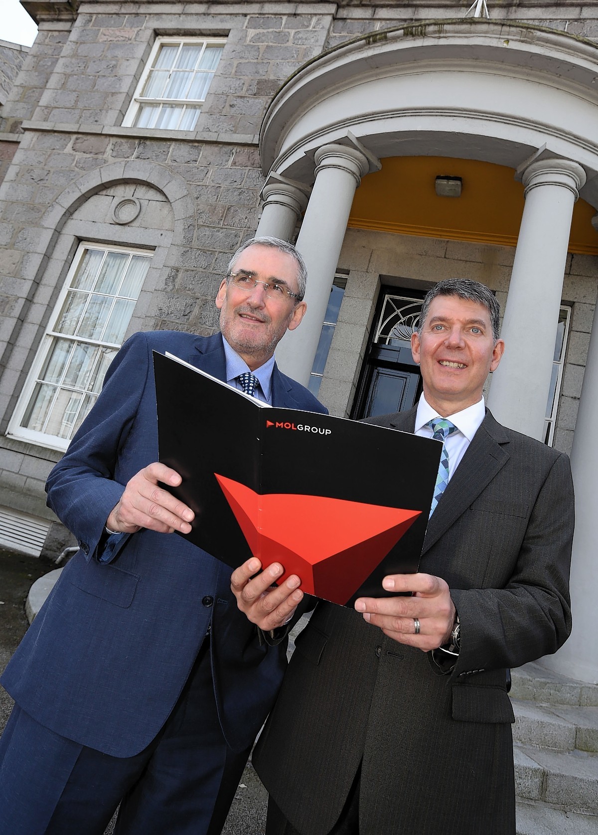 Caption: L  - R Alex Dodds and Chris Bird at the Aberdeen offices of MOL Group