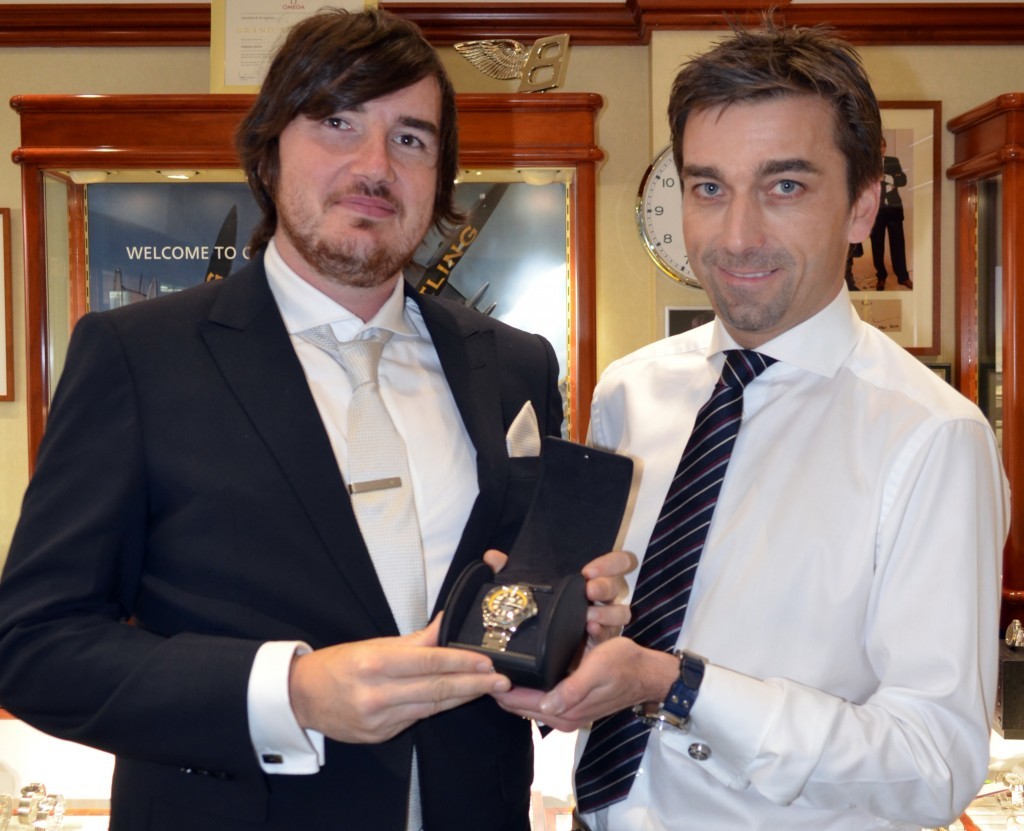 Jamie Gray, left, receives his Breitling from Matthew Finnie.