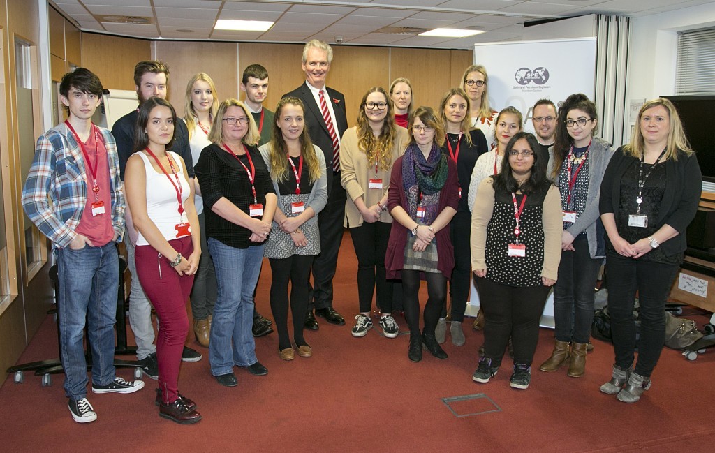 Ian Philips, suited, with the RGU students who are taking part in the trophy design competition.